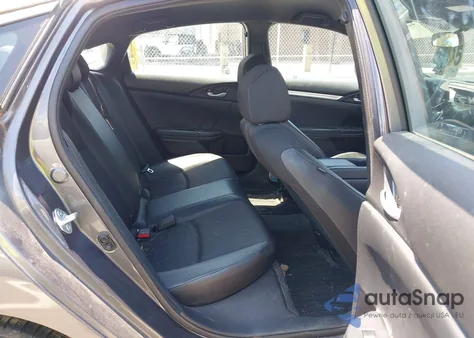 2021 Honda Civic Sport from USA, damaged, VIN 2HGFC2F83MH556803